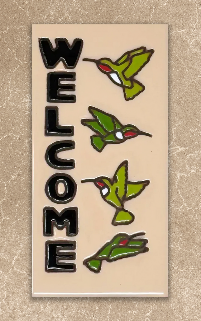 welcome hummingbirds tile on beige background