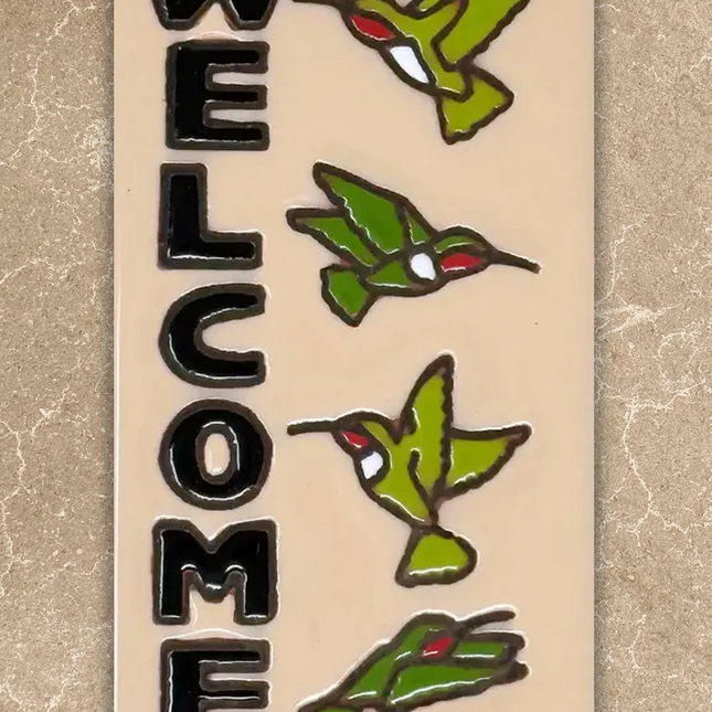 welcome hummingbirds tile on beige background