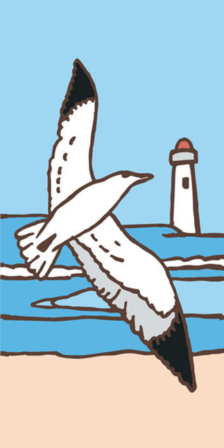 Seagull flying over a beach with a lighthouse in the background