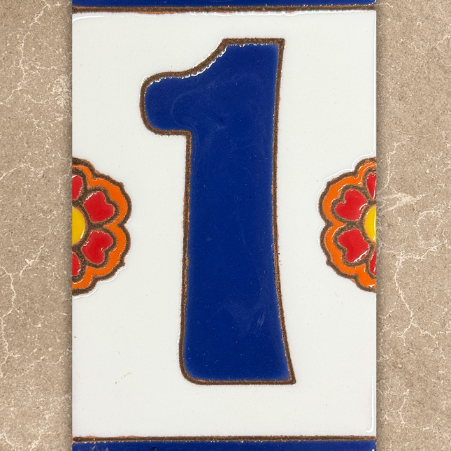 Decorative tile with the number '1' on a beige background