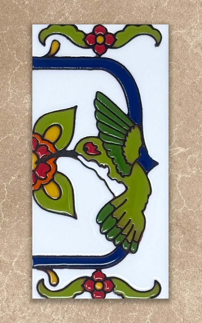 Decorative tile with a green bird and red flowers on a beige background