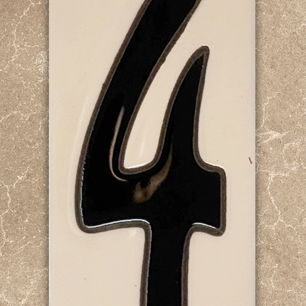 Black number '4' on a beige background
