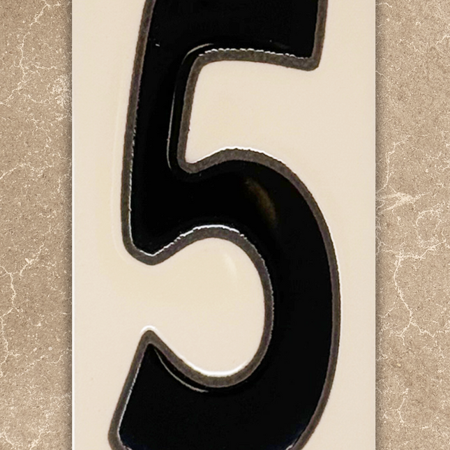 Black number '5' on a beige background