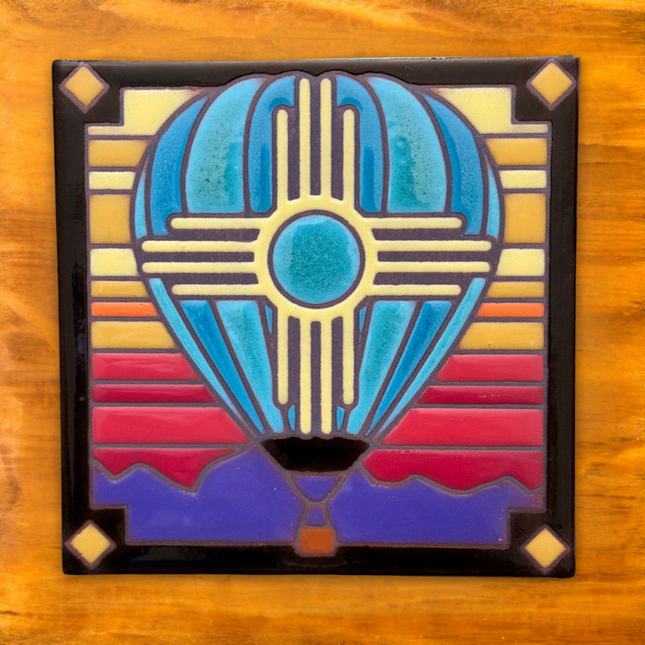 Colorful hot air balloon design on a wooden background