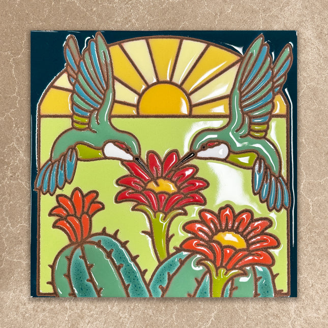 Decorative tile with birds, flowers, and a cactus on a beige background