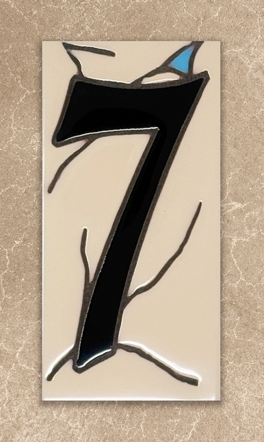 Decorative number '7' with artistic design on a beige background