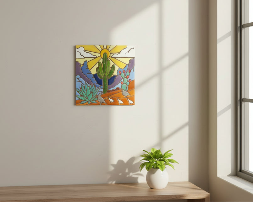 Decorative tile with a desert landscape featuring cacti, a sun, and birds on a beige background.