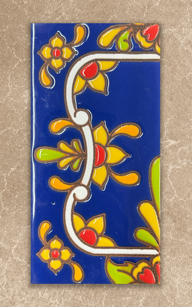 Decorative tile with floral patterns on a blue background