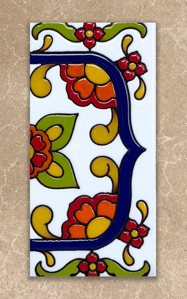 Decorative tile with colorful floral design on a beige background