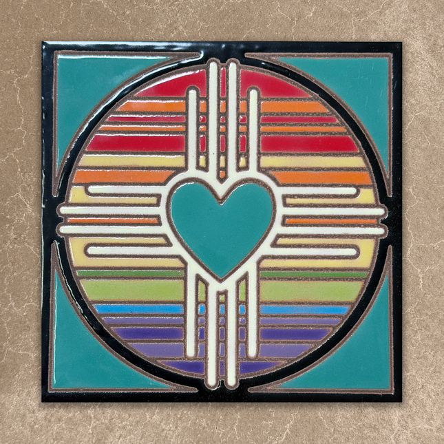 Decorative tile with a heart design and rainbow colors on a beige background