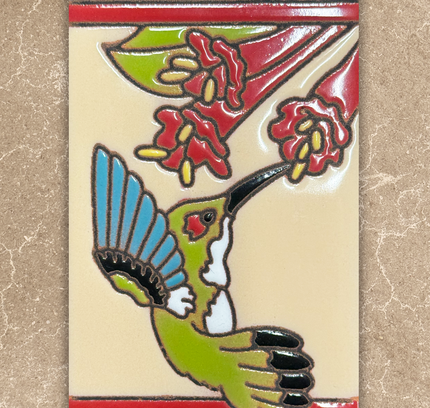 Decorative tile with a hummingbird and floral design on a beige background